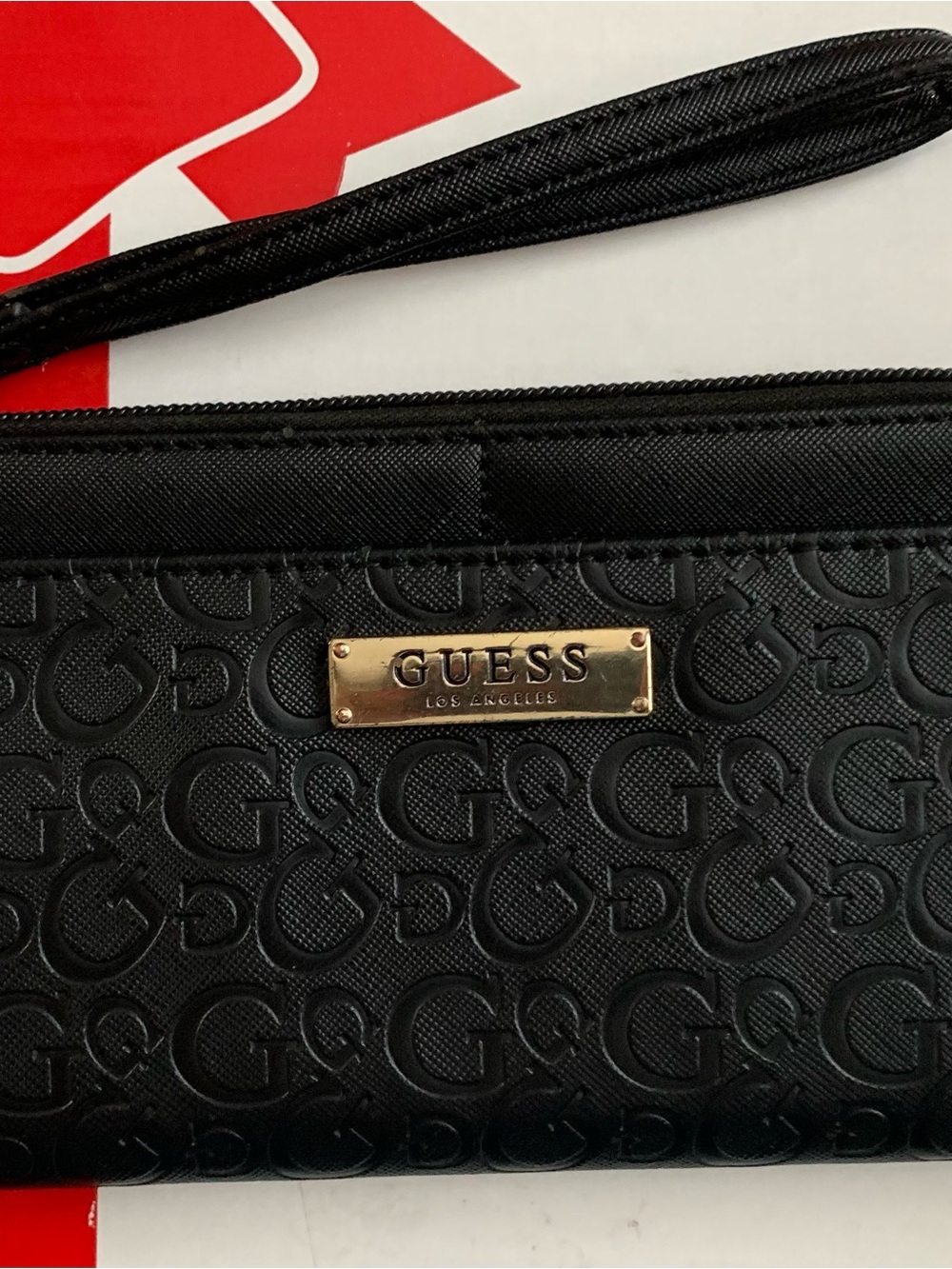 Guess Black Embossed Logo Wristlet with Gold Plaque